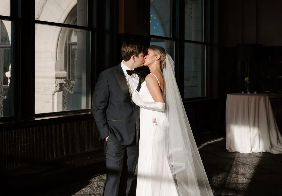 Bride and groom kissing